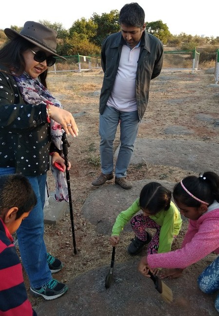 Dinosaur Princess Aaliya Sultana Babi explaining about excavation and fossils of Rajasaurus Narmadensis, the Rahiolisaurus gujaratensis, and the long-necked titanosaurid at Rayioli Fossil Park, near Balasinor, blog by The Kid Who Travelled.